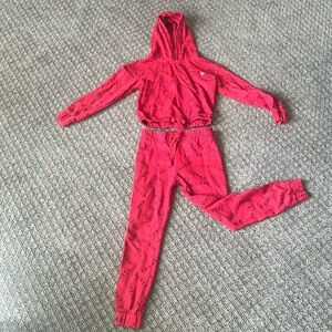 Girl’s knit jumpsuit by Guess